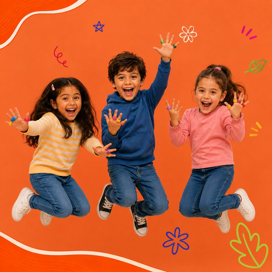 Three kids jumping and smiling, holding Chrishco fidget rings